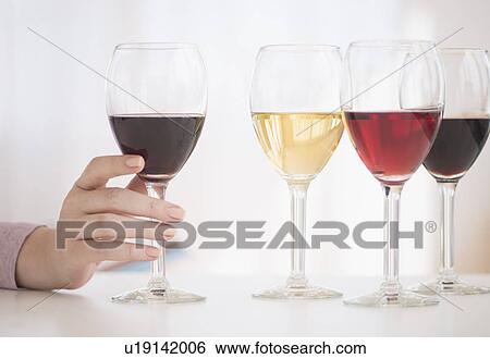Stock Photograph - Glasses with red, rose and white wine. Fotosearch