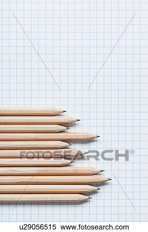 Grouping of wooden pencils in graph shape on graph paper View Large Photo Image Stock Photography - Grouping of wooden pencils in graph shape on graph paper. Fotosearch