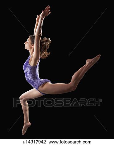 Gymnast jumping View Large Photo Image Stock Image - Gymnast jumping. Fotosearch