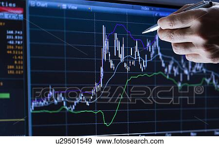 Hand pointing at financial graph, studio shot View Large Photo Image Stock Photo - Hand pointing at financial graph, studio shot. Fotosearch