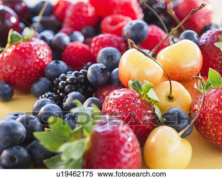 Stock Photography - Heap of fresh fruits. Fotosearch