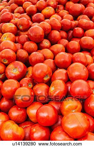 Stock Image - Heap of tomatoes. Fotosearch