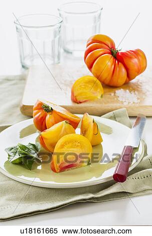 Heirloom tomatoes, studio shot View Large Photo Image Stock Photography - Heirloom tomatoes, studio shot. Fotosearch