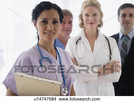 Picture - Hospital staff with office workers. Fotosearch