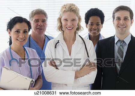 Hospital staff with office workers View Large Photo Image Stock Image - Hospital staff with office workers. Fotosearch