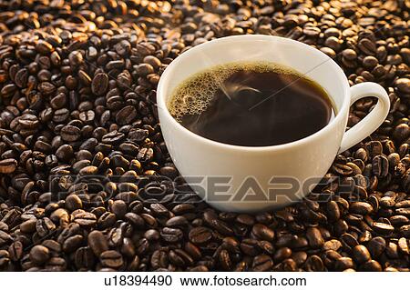 Stock Image - Hot coffee, studio shot. Fotosearch