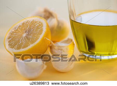 Lemon, garlic and jar of honey View Large Photo Image Stock Image - Lemon, garlic and jar of honey. Fotosearch
