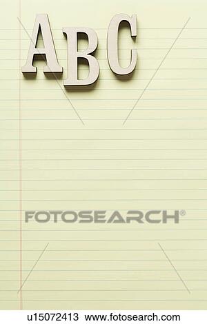 Stock Image - Letters A, B and C on yellow legal pad. Fotosearch