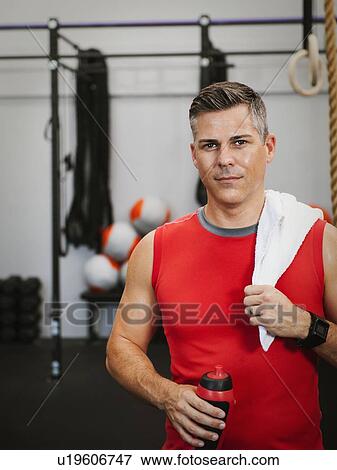 Mature man taking break from exercising View Large Photo Image Stock Photo - Mature man taking break from exercising. Fotosearch