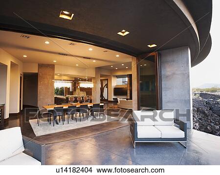 Modern living room facing terrace View Large Photo Image Picture - Modern living room facing terrace. Fotosearch