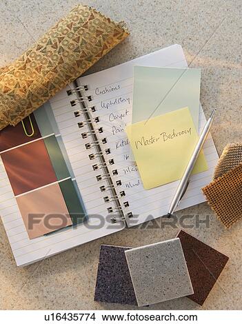 Picture - Notebook and color samples. Fotosearch