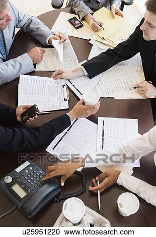 Office meeting in conference room View Large Photo Image Stock Image - Office meeting in conference room. Fotosearch