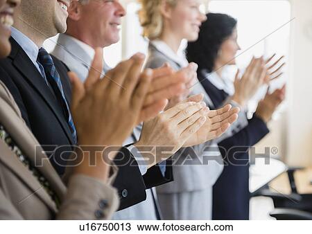 Stock Image - Office workers applauding. Fotosearch