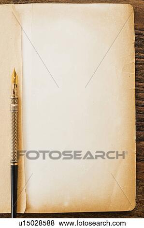 Old brown paper with fountain pen, studio shot View Large Photo Image Stock Photo - Old brown paper with fountain pen, studio shot. Fotosearch