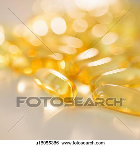 Stock Photograph - Omega fatty acid pills on white background, studio shot. Fotosearch