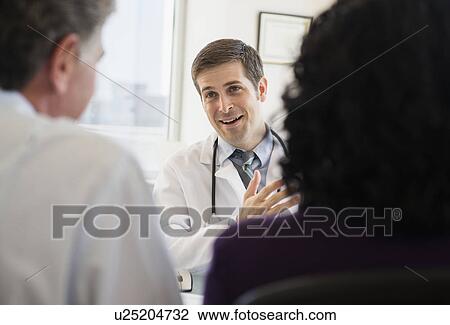 Patients during hospital consultation View Large Photo Image Stock Image - Patients during hospital consultation. Fotosearch