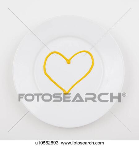 Plate with heart made of mustard View Large Photo Image Stock Image - Plate with heart made of mustard. Fotosearch