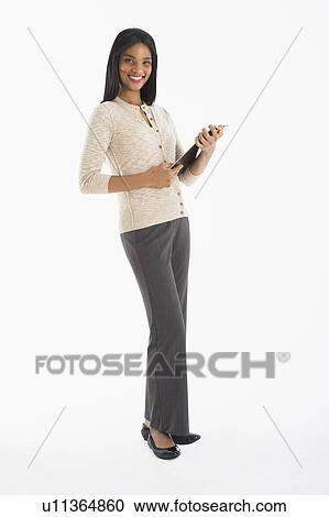 Portrait of businesswoman, studio shot View Large Photo Image Stock Image - Portrait of businesswoman, studio shot. Fotosearch