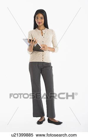 Stock Photography - Portrait of businesswoman, studio shot. Fotosearch