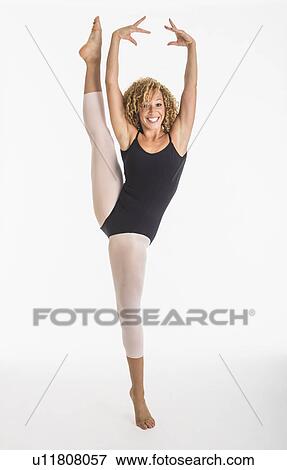 Portrait of female ballet dancer during practicing, studio shot View Large Photo Image Stock Photo - Portrait of female ballet dancer during practicing, studio shot. Fotosearch