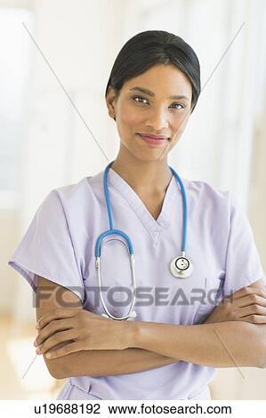 Portrait of female doctor View Large Photo Image Stock Image - Portrait of female doctor. Fotosearch