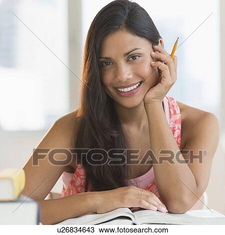 Stock Image - Portrait of female student. Fotosearch