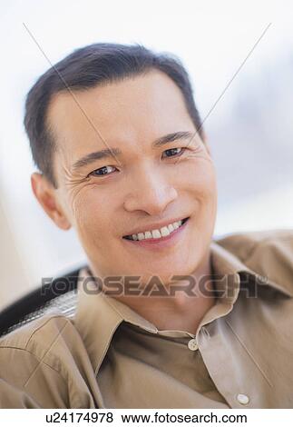 Portrait of happy mid adult man View Large Photo Image Stock Photo - Portrait of happy mid adult man. Fotosearch