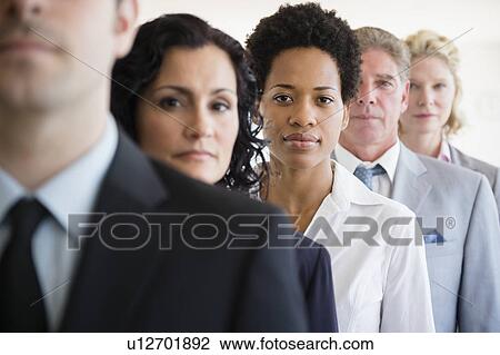 Portrait of office workers standing in row View Large Photo Image Stock Image - Portrait of office workers standing in row. Fotosearch