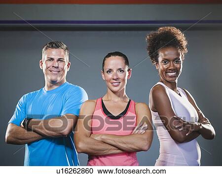 Portrait of three people with crossed arms View Large Photo Image Stock Image - Portrait of three people with crossed arms. Fotosearch
