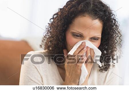 Portrait of woman blowing nose View Large Photo Image Stock Photograph - Portrait of woman blowing nose. Fotosearch