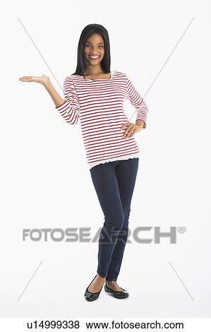 Portrait of woman gesturing, studio shot View Large Photo Image Stock Photo - Portrait of woman gesturing, studio shot. Fotosearch