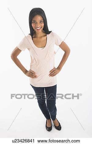 Portrait of woman smiling, studio shot View Large Photo Image Stock Image - Portrait of woman smiling, studio shot. Fotosearch