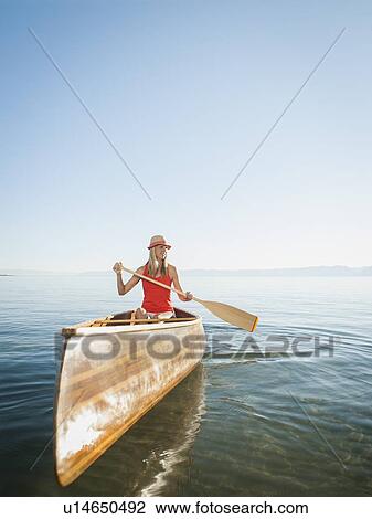 Portrait of young woman canoe traveling View Large Photo Image Stock Image - Portrait of young woman canoe traveling. Fotosearch