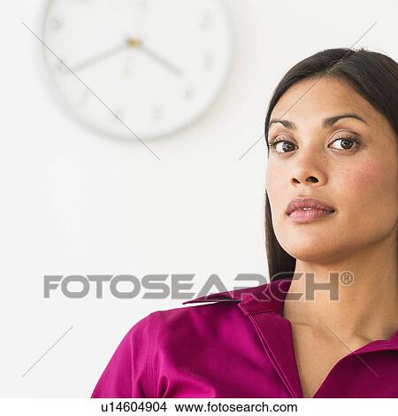 Picture - Portrait of young woman in office. Fotosearch