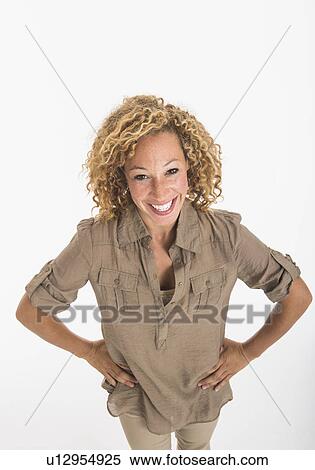 Portrait of young woman on white background, studio shot View Large Photo Image Stock Photography - Portrait of young woman on white background, studio shot. Fotosearch