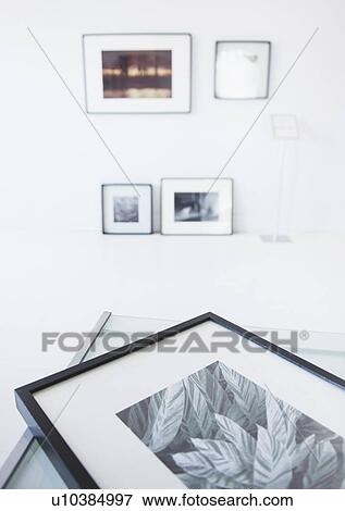 Stock Photo - Preparations for new exhibitions in gallery. Fotosearch