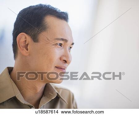 Picture - Profile of happy mid adult man. Fotosearch