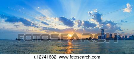 Puffy clouds on sky View Large Photo Image Stock Image - Puffy clouds on sky. Fotosearch