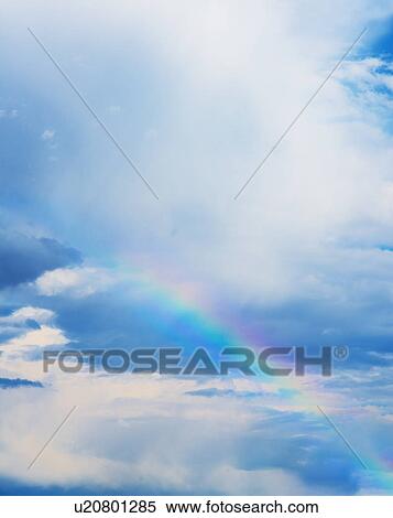 Rainbow in clouds View Large Photo Image Stock Photography - Rainbow in clouds. Fotosearch