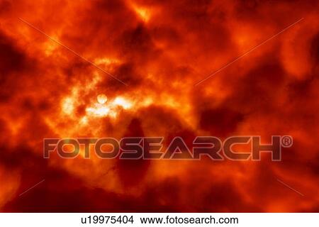 Picture - Red sky with clouds at sunset. Fotosearch