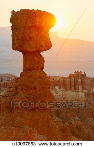 Stock Image - Rock formations at sunset. Fotosearch