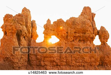 Stock Image - Rock formations at sunset. Fotosearch