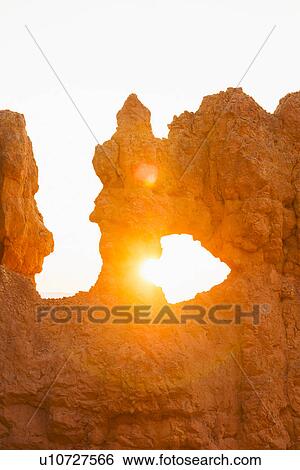 Stock Photograph - Rock formations at sunset. Fotosearch