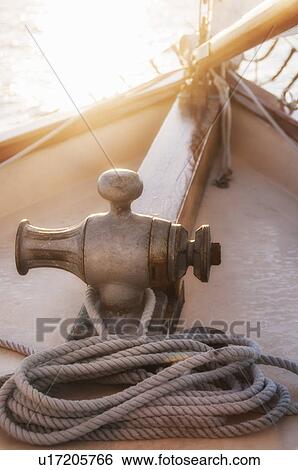 Rope coiled on yacht bow in sunset light View Large Photo Image Stock Photograph - Rope coiled on yacht bow in sunset light. Fotosearch