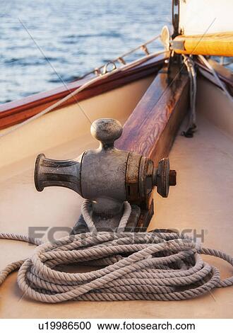 Rope coiled on yacht bow View Large Photo Image Stock Image - Rope coiled on yacht bow . Fotosearch