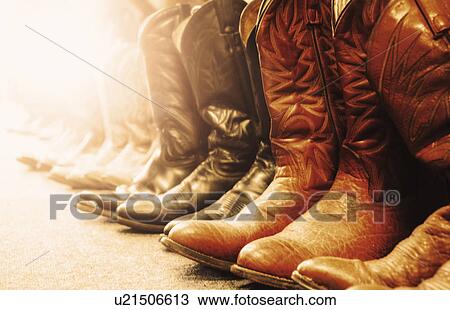 Stock Image - Row of cowboy boots. Fotosearch