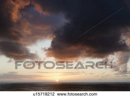 Sea at sunset View Large Photo Image Stock Image - Sea at sunset. Fotosearch