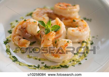 Picture - Seafood on plate in restaurant. Fotosearch