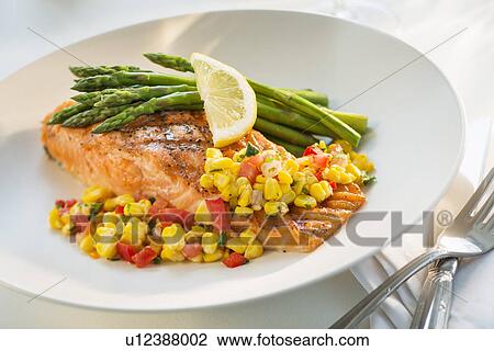 Seafood on plate in restaurant View Large Photo Image Stock Image - Seafood on plate in restaurant. Fotosearch