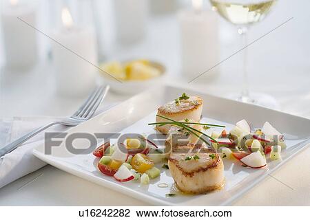 Seafood on plate in restaurant View Large Photo Image Stock Image - Seafood on plate in restaurant. Fotosearch